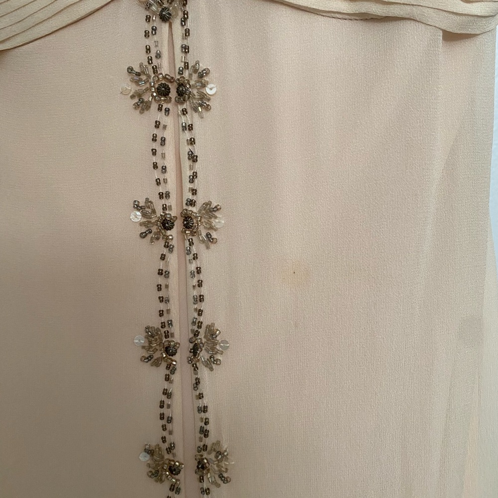 Gown. Blush/ nude color with beads.side zipper. Already cleaned. Ready to wear